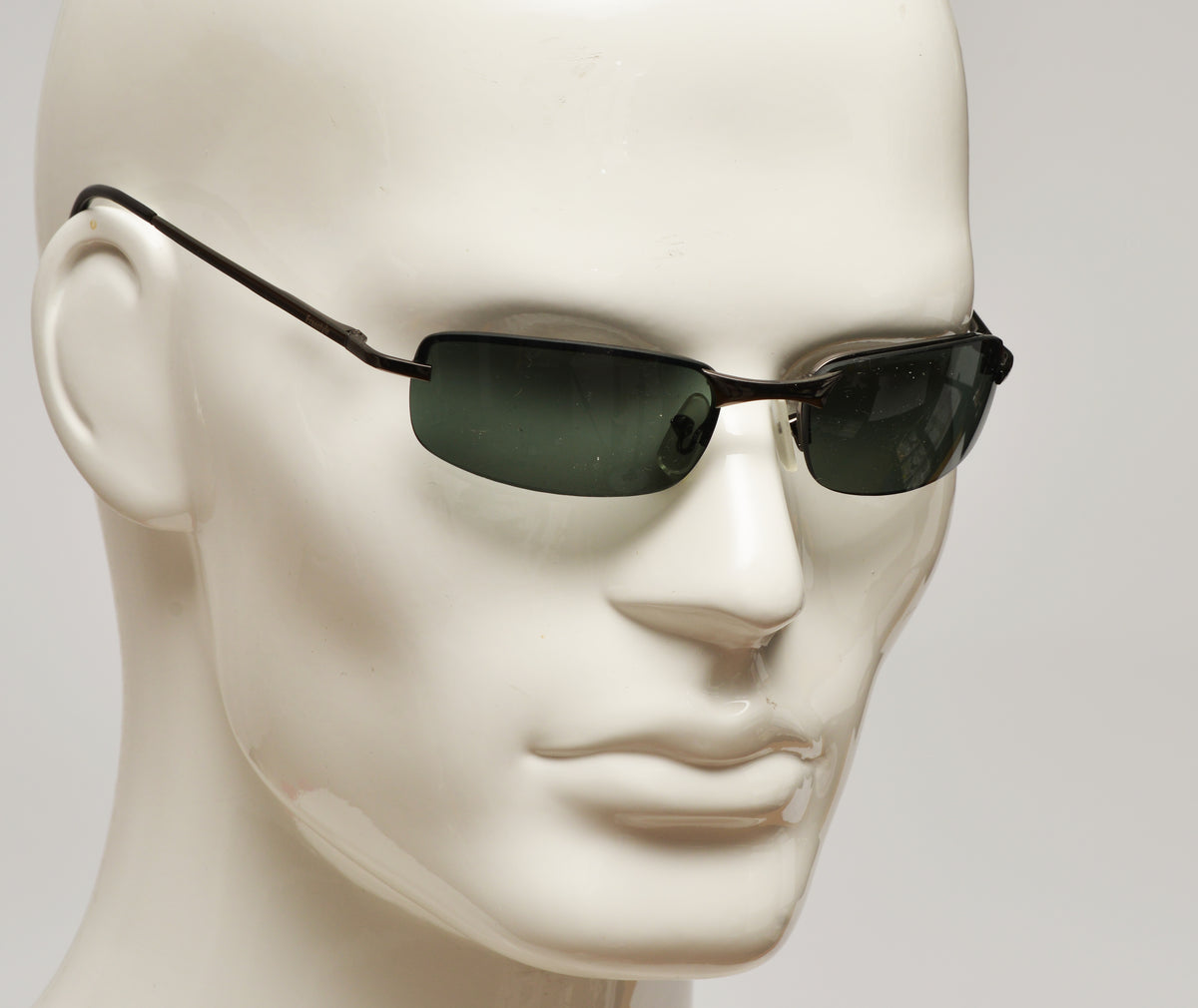 Freestyle Sonnenbrille 7464-001 mit anthrazitfarbenem Metallrahmen und dunkelgrünen Gläsern