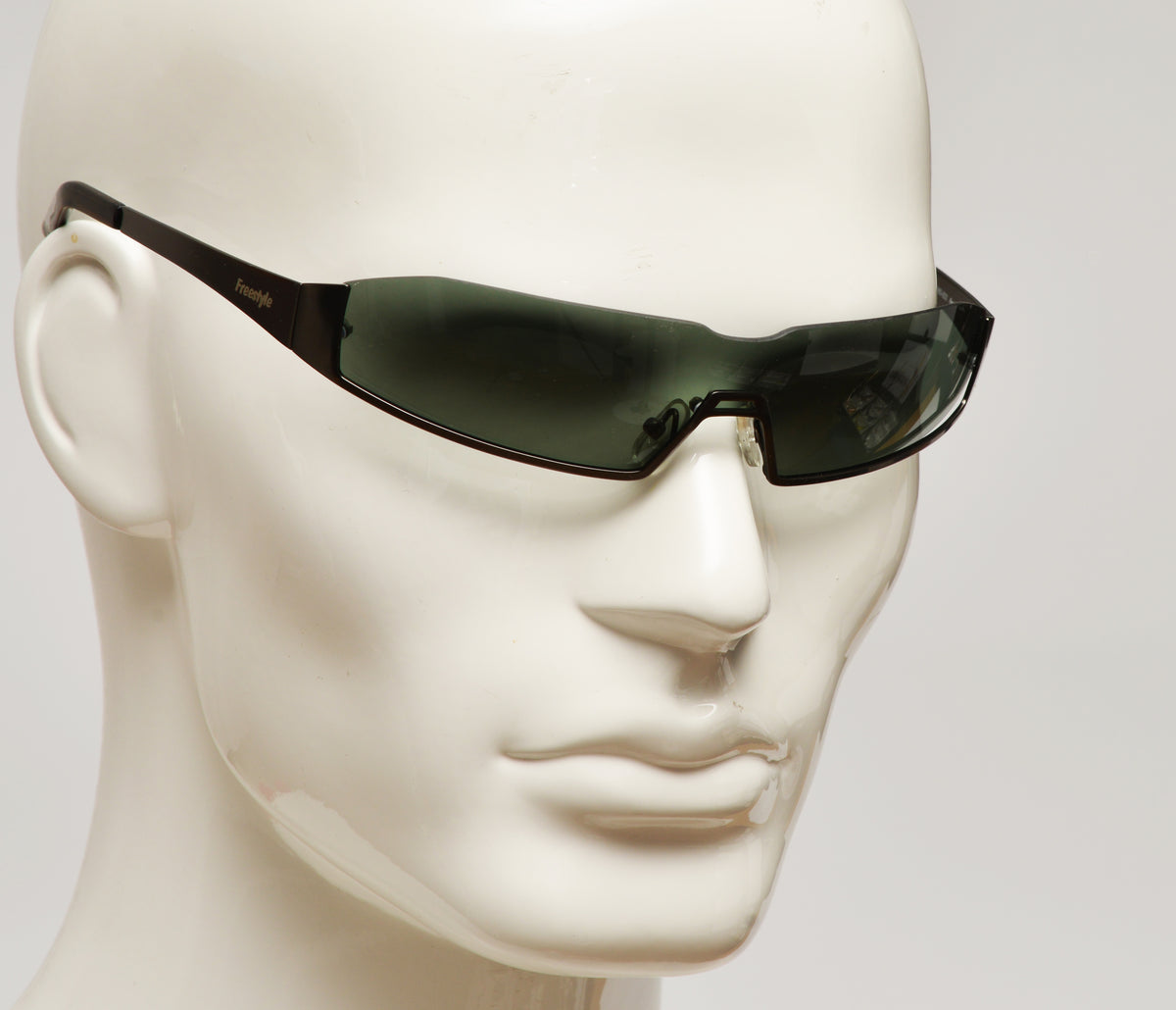 Freestyle Sonnenbrille 7465-003 – dunkelgrün, durchgehendes Glas, UV 400, Filterkategorie 2