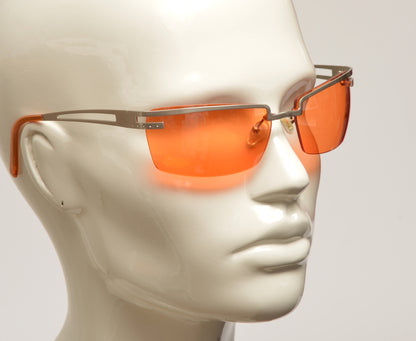 Freestyle Sonnenbrille 7469-002 mit hell bronzefarbenem Metallrahmen und orange getönten Gläsern