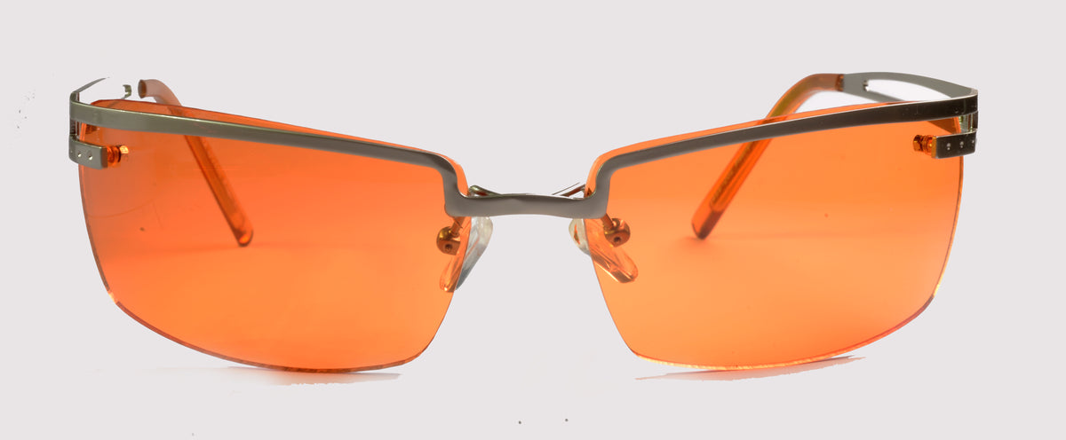 Unisex-Sonnenbrille Freestyle 7469-002 mit hell bronzefarbenem Metallrahmen und orange getönten Gläsern