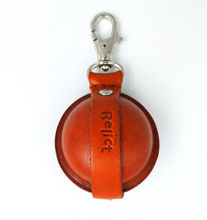 Orange Relict Boule, Rückseite mit eingeprägtem Relict-Schriftzug